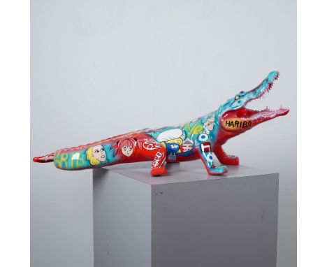 A vibrant and bold crocodile sculpture in the style of Richard Orlinski featuring a dynamic fusion of pop culture imagery, br