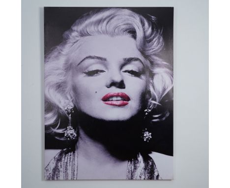 This stunning black and white canvas print captures an iconic close-up portrait of Marilyn Monroe, accentuated with a selecti