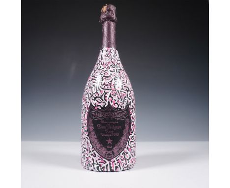 A rare and collectible bottle of Dom Perignon Rose Vintage 2008, uniquely customized by artist Abraham Onkst. The bottle feat