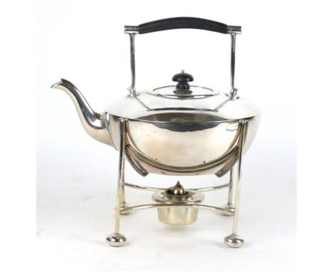 A George V hallmark silver tea pot and hot water hot water kettle on a stand with spirit lamp
Each having a cast beaded rim, 