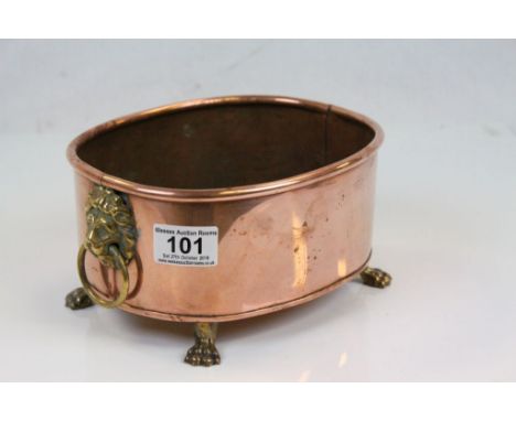 Copper Oval Planter with Brass Lion Mask Ring Handles and Brass Paw Feet