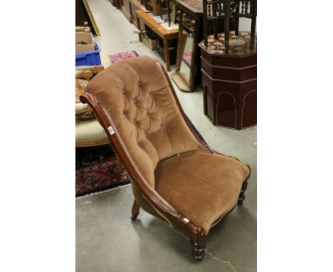 Victorian Button Back Salon Chair with Scroll Carved Frame and Turned Legs with Ceramic Castors