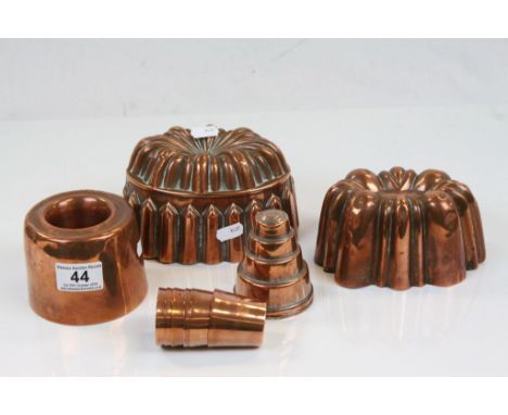 Collection of vintage Copper Jelly Moulds to include one marked "F.W &amp; Co 600" and another numbered 107