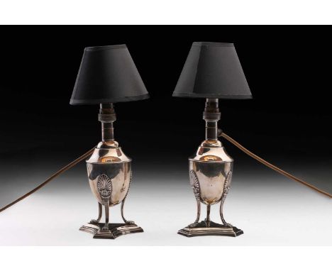 A pair of Edwardian silver baluster table lamps Sheffield 1904 by Mappin &amp; Webb, each converted from an oil lamp and fitt