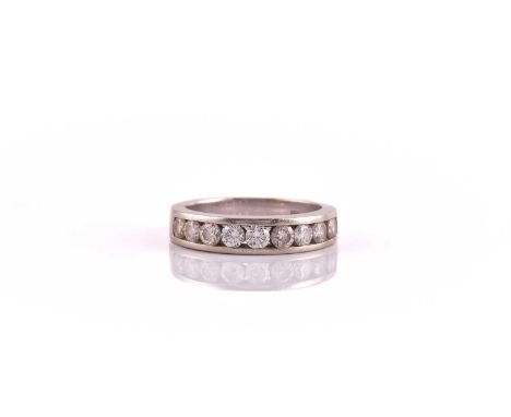 A diamond half eternity ring, consisting of nine graduated brilliant diamonds, with an estimated total weight of 0.86ct, chan