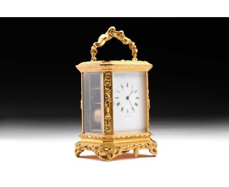 A 19th-century Bolvillier of Paris 8-day carriage clock with elaborate water gilt canted case mounted with entwined mermaids 