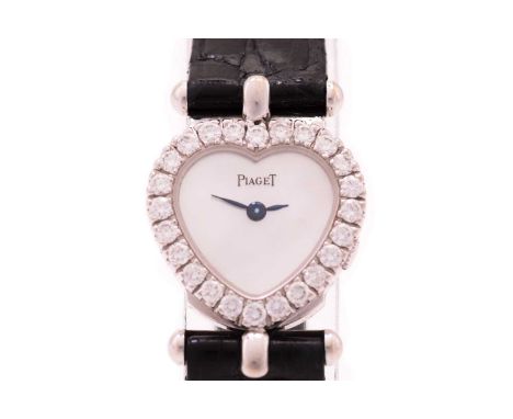 A Piaget lady's diamond set dress watch, with a swiss made quartz ultrathin movement in an 18ct white gold heart shape case m