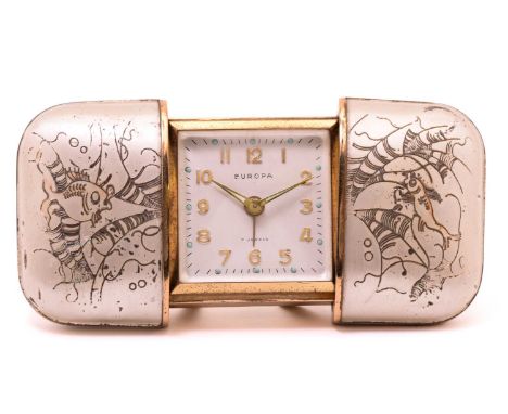 A 1920's Europa Travel clock, with a hand-wound 7 jewelled movement featuring a mechanical alarm in a gilt retractable lozeng