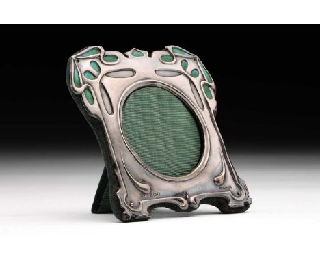 An Edwardian silver and enamel photograph frame, in Art Nouveau style, the velvet back with easel stand, London 1903, by Will