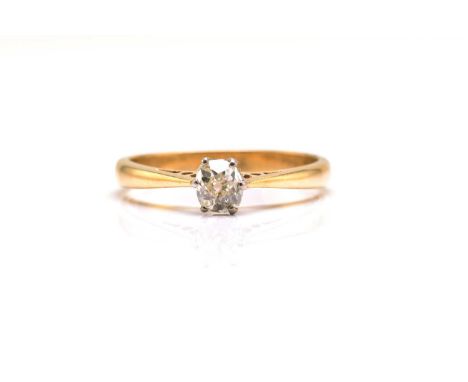 An 18ct yellow gold and diamond solitaire ring, comprises an old mine-cut diamond of approximately 0.31ct, claw set on a cath