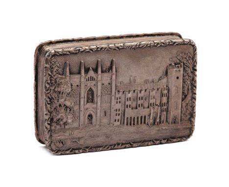 A William IV castle top vinaigrette; rounded rectangular; the hinged cover depicting Newstead Abbey in relief within a foliat