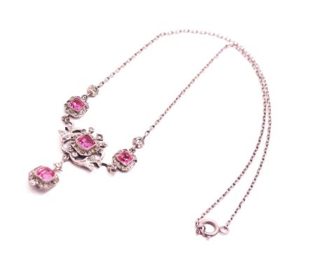 A pink paste necklace in white metal, featuring four bright pink foil-backed pastes, collet set in white metal mounts embelli