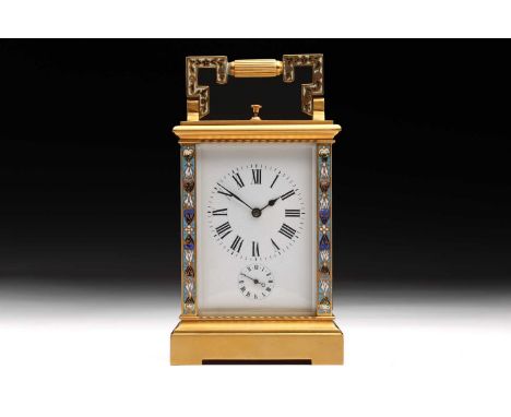 An early 20th-century champleve enamel decorated" Anglaise" cased 8-day alarm repeater carriage clock with a distinctive fold