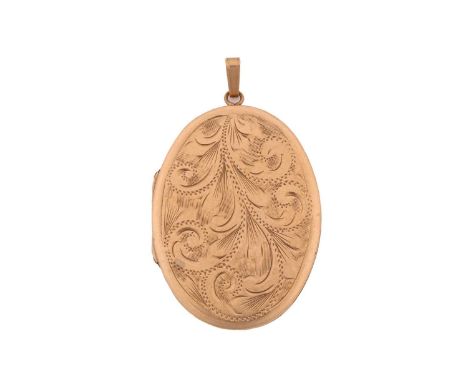 A 9ct gold oval locket, with scrollwork engravings on the case and engine turning patterns on the reverse, the locket is atta