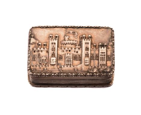 A William IV castle top vinaigrette; rounded rectangular; the hinged cover depicting Windsor Castle in relief within a foliat