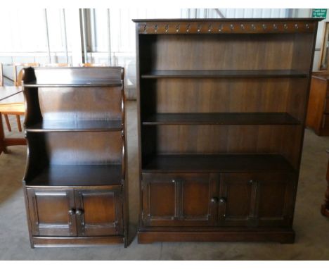 Two bookcases: A large dark oak 3 shelf bookcase, together with a similar item. (2)