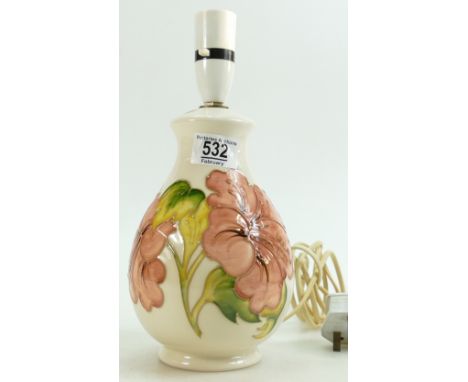 Moorcroft Hibiscus on cream ground lamp base: height 29cm