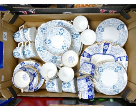 A collection of blue and white floral decorated Victorian tea ware: Including cups saucers side plates etc.