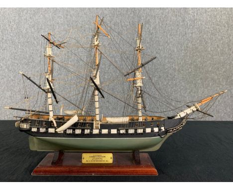 A hand made model of the US frigate Constitution with maker's mark to the underside. H.33 W.48cm 