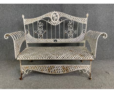 A vintage 19th century style painted iron conservatory or garden two seater bench sofa. H.102 W.137 D.60cm 