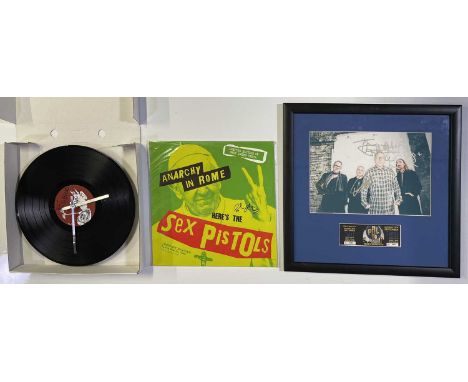 Signed items to inc: 'Anarchy In Rome' signed by Glen Matlock, a 'vinyl clock' signed to label by John Lydon, a mounted and f