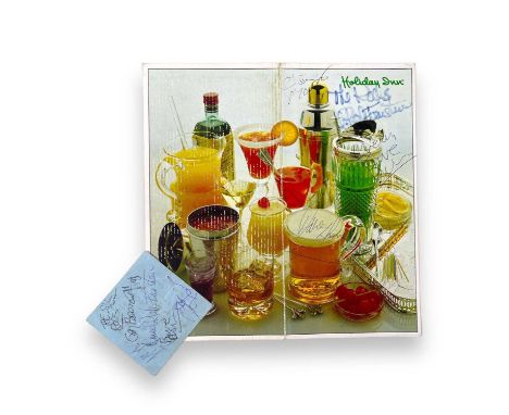 A Holiday Inn menu card c 1980s (20.5x21cm unfolded) signed to cover by Dave Murray, Bruce Dickinson and members of The Rods 