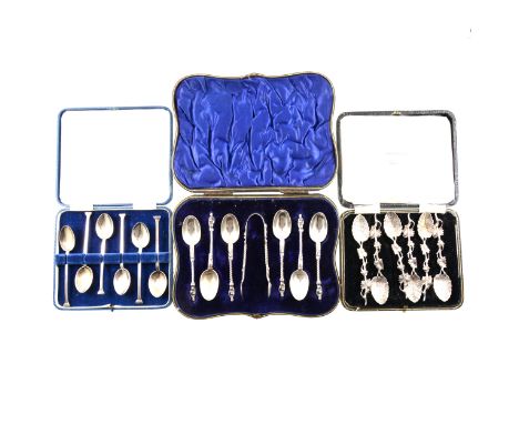 A cased set of six silver teaspoons with apostle finials and a pair of sugar tongs by William Hutton &amp; Sons Ltd, London 1