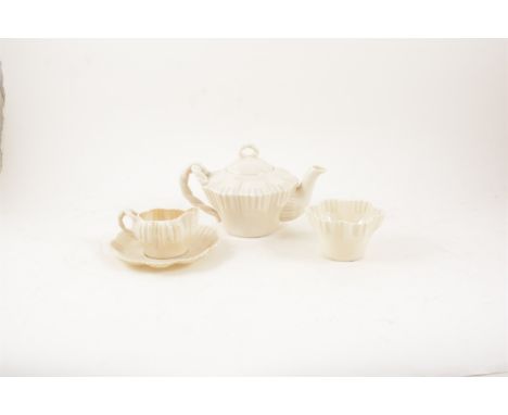 Belleek opalescent china part teaset, comprising teapot, 13cm, milk jug, sugar bowl, three cups and four saucers. (10)