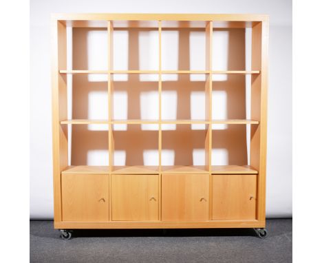 Contemporary light beech open bookcase, with twelve divisions over four doors, width 163cm, height 171cm; and a similar unit,