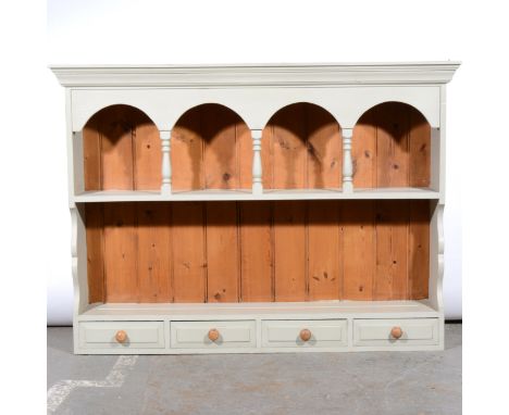 Grey painted wall unit, with an arcaded shelf, and four drawers under, width 127cm, height 91cm.