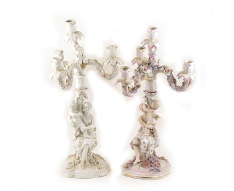 German porcelain four-light candelabra, probably Sitzendorf, encrusted branches, the column modelled with mother and child, 4