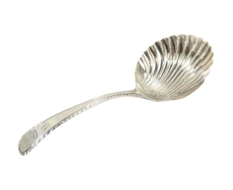 A silver caddy spoon - 19th century, with a shell shaped bowl, 11.3g.