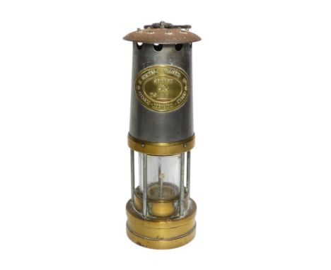 A miner's safety lamp - E Thomas Willams, brass and steel, 26cm high.