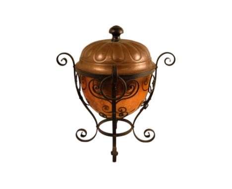 A late 19th century Arts and Crafts style copper and wrought iron coal scuttle - circular with a gadrooned cover, globe shape