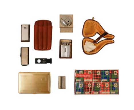 A collection of smoking ephemera - including a meerschaum pipe, a tan leather cigar case, a cigarette case, a Ronson table li