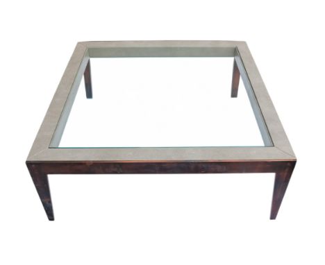 A contemporary faux shagreen and bronze glass topped coffee table - square with narrow tapering legs, 120 x 120 x 45cm.