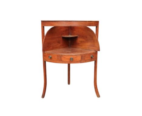 A 19th century mahogany corner washstand - with a raised back incorporating a shelf, the top with three apertures, on square 