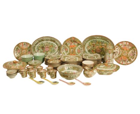 An early 20th century Cantonese part dinner service - famille verte floral decoration, comprising two lidded tureens, a coffe