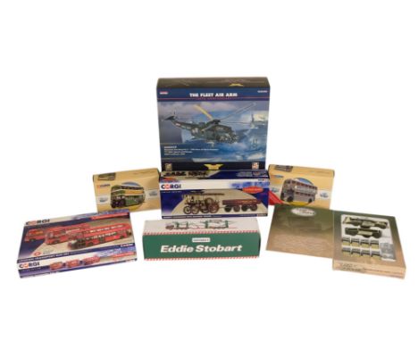 Seven Corgi die cast vehicles - including a Westland Sea King helicopter, three boxes of buses, Land Rover commemorative set,