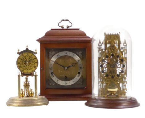 An Elliott mantel clock - in a mahogany case, the dial with a silver chapter ring set out in Roman numerals, 30cm high, toget