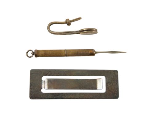 A silver money clip - Sheffield 1973, together with a silver napkin clip and a tooth-pick.
