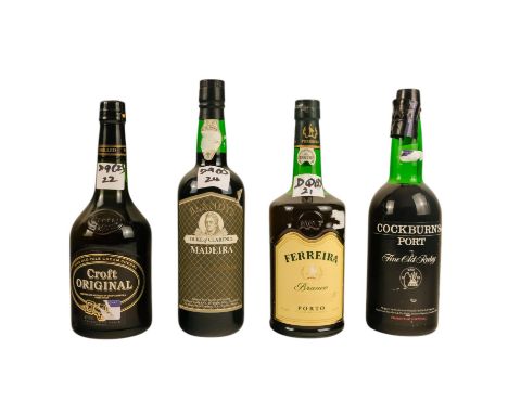 A bottle of Cockburn's Fine Old Ruby port - together with a bottle of Ferreira Branco port, a bottle of Blandy's Duke of Clar