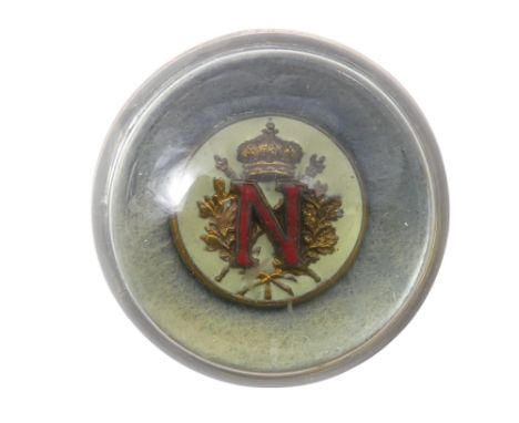 A vintage glass paperweight - at the centre an enamelled crest with the initial N, crossed sceptres, an Imperial Crown and oa