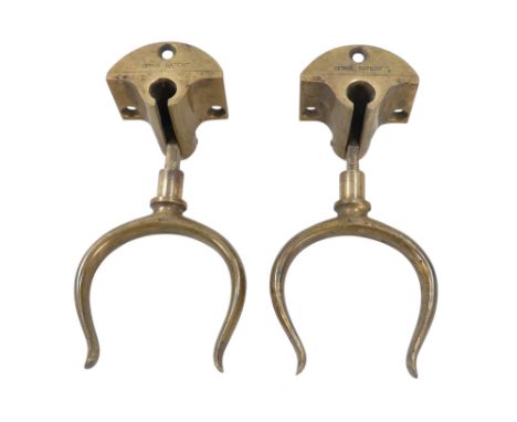 A pair of late 19th century Lyths Patent rowlocks - cast in bronze and incorporating an unusual folding mechanism, 17cm high.
