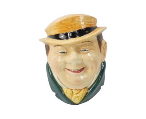 A Beswick wall plaque - Tony Weller 'It's the old 'un' wearing a straw hat and green jacket, 19cm high.