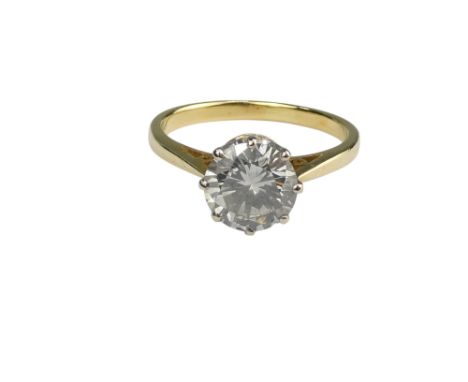 An 18ct gold single stone diamond ring - claw set with pierced shoulders, with an insurance certificate indicating stone weig