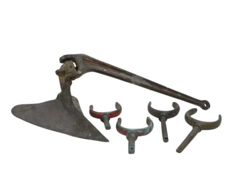 A bronze plough anchor - together with two pairs of bronze rowlocks.