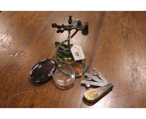 Vintage lamp, magnifier and blood letting tool