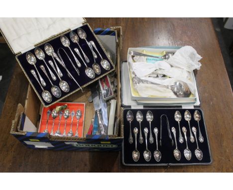 Box of cutlery, two cased sets of 12 teaspoons and sugar tongs, silver handled button hook, silver handled cake knife etc