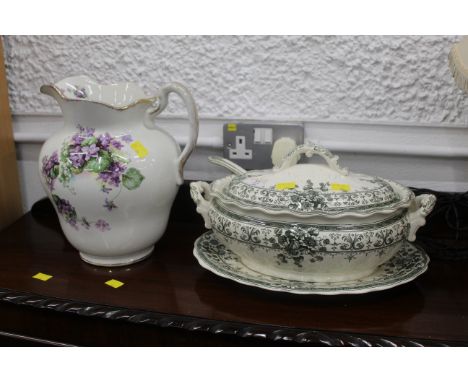 Late 19th century/early 20th century water jug 28 cm high, and early 20th century tureen with base, cover and ladle 36 cm lon
